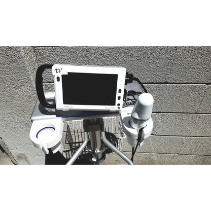 White biocare 7500 ultrasound machine with black handle and silver metallic frame for bladder volume measurement