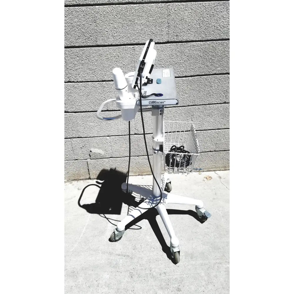 White cubescan biocon-700 bladder volume measurement system on wheeled stand with transducer and basket for volume measurement