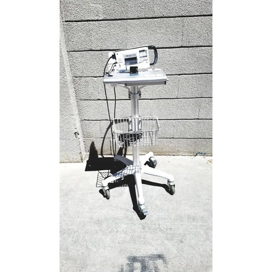 White medical cart with wheeled base and metal basket holding cubescan biocon-700 for bladder volume measurement