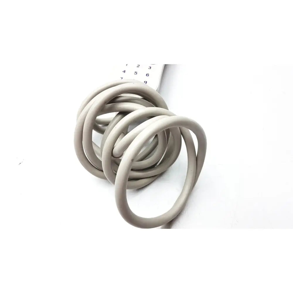 Coiled gray cable with white remote control for curbell getwell network nurse call remote p n 4e370e 0103468