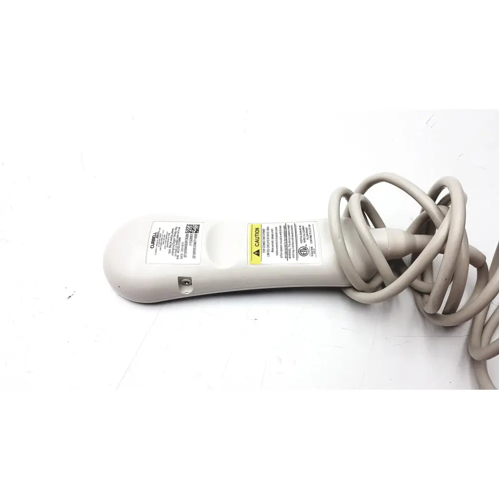 Beige plastic handheld curbell getwell network nurse call remote with coiled gray cable and warning labels