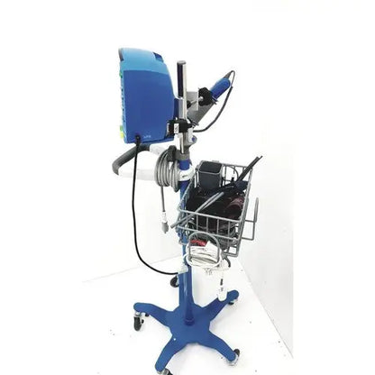 Blue cynergy cynosure dermatology laser device with mounted monitor, adjustable arm, and wire basket for accessories