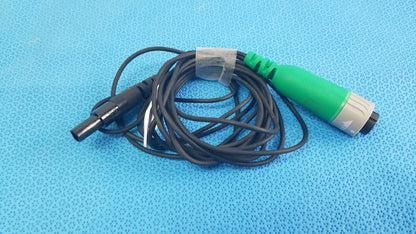 Black coiled catheter connector cable with green gray connector and black plug for reuse medical equipment in EnSite X EP system
