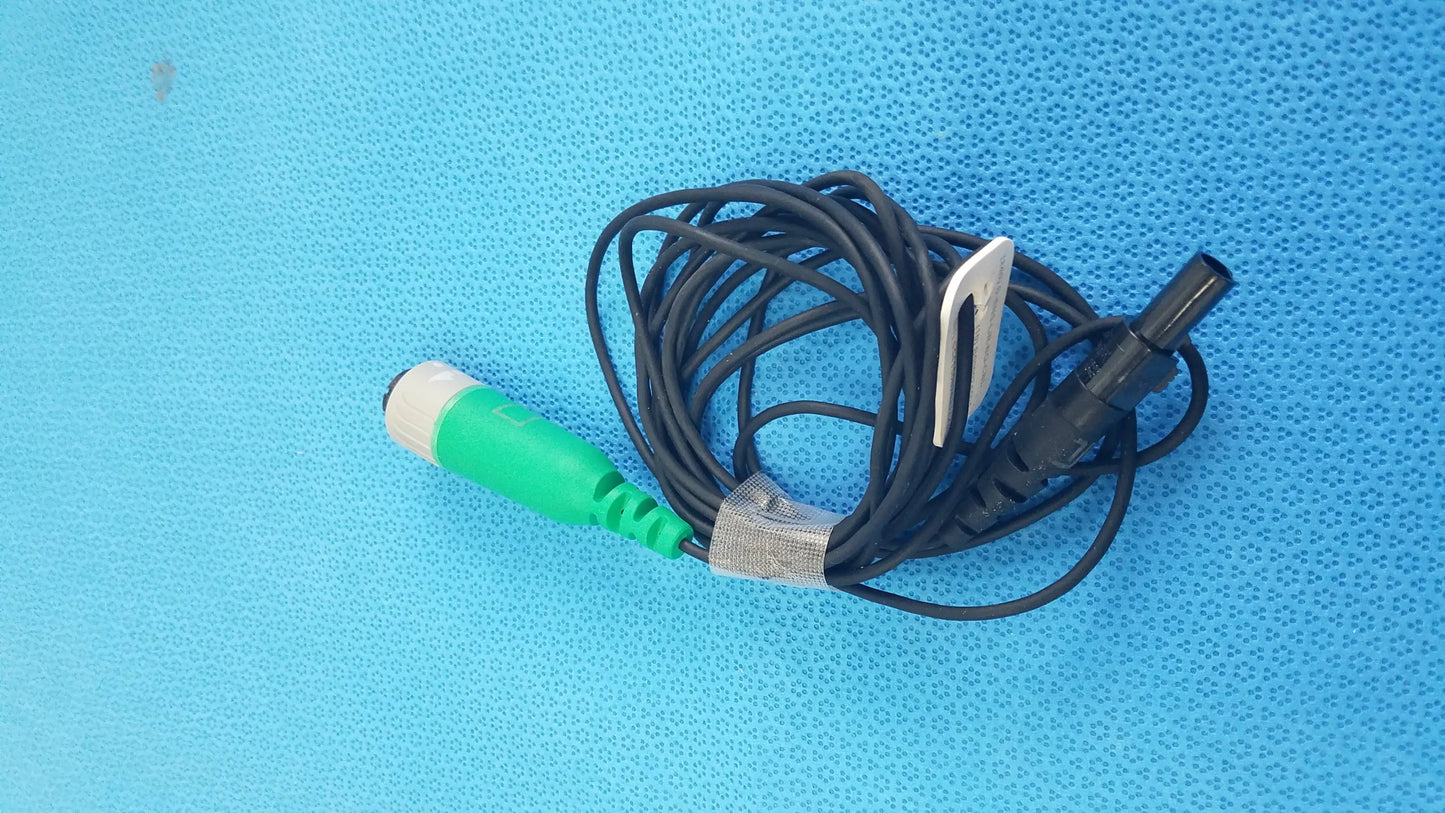 Green and white medical catheter connector cable with black coiled wire for reuse medical equipment EnSite X EP system