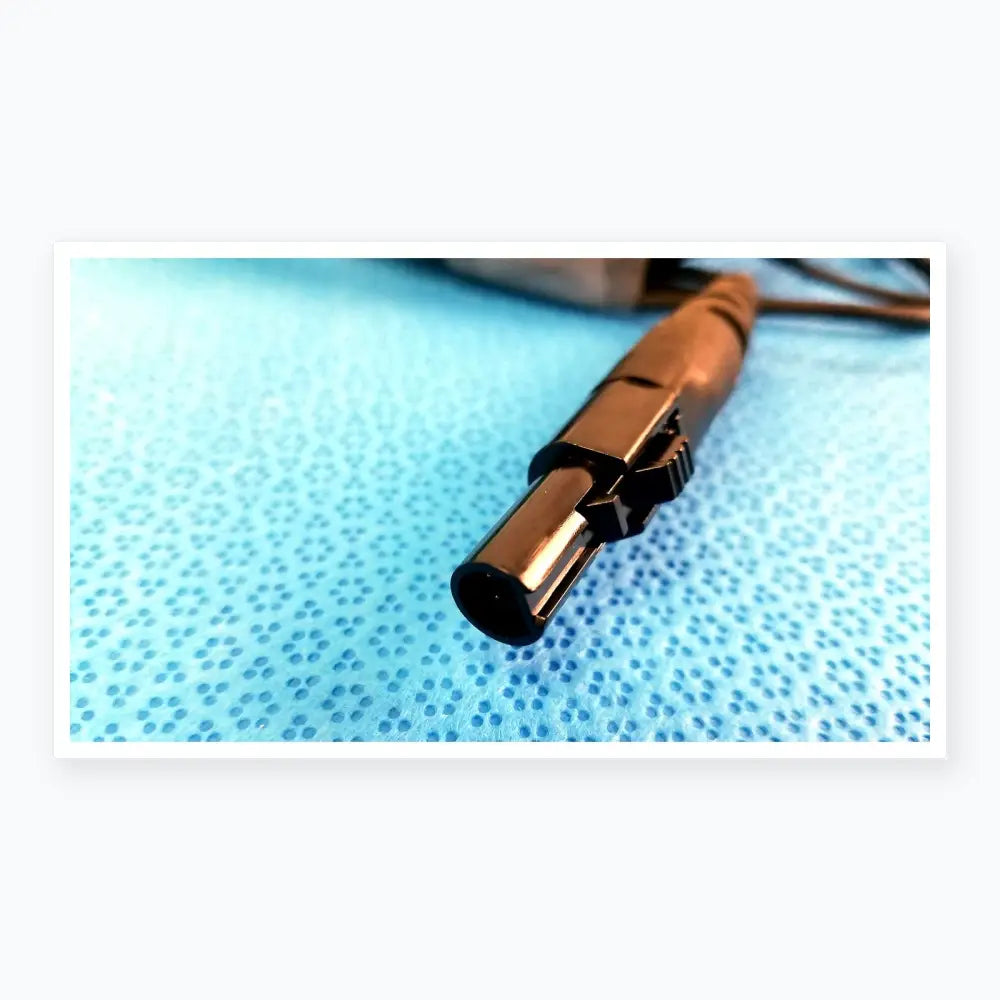 Black plastic cylindrical catheter connector cable with ridged locking mechanism for reuse medical equipment, EnSite X EP system