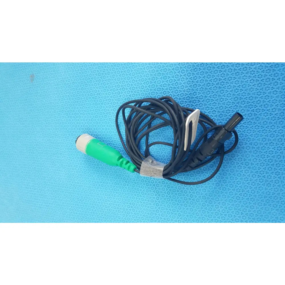 Green and white medical catheter connector cable with black coiled wire for reuse medical equipment EnSite X EP system