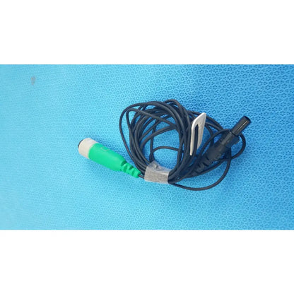 Green and white medical catheter connector cable with black coiled wire for reuse medical equipment EnSite X EP system