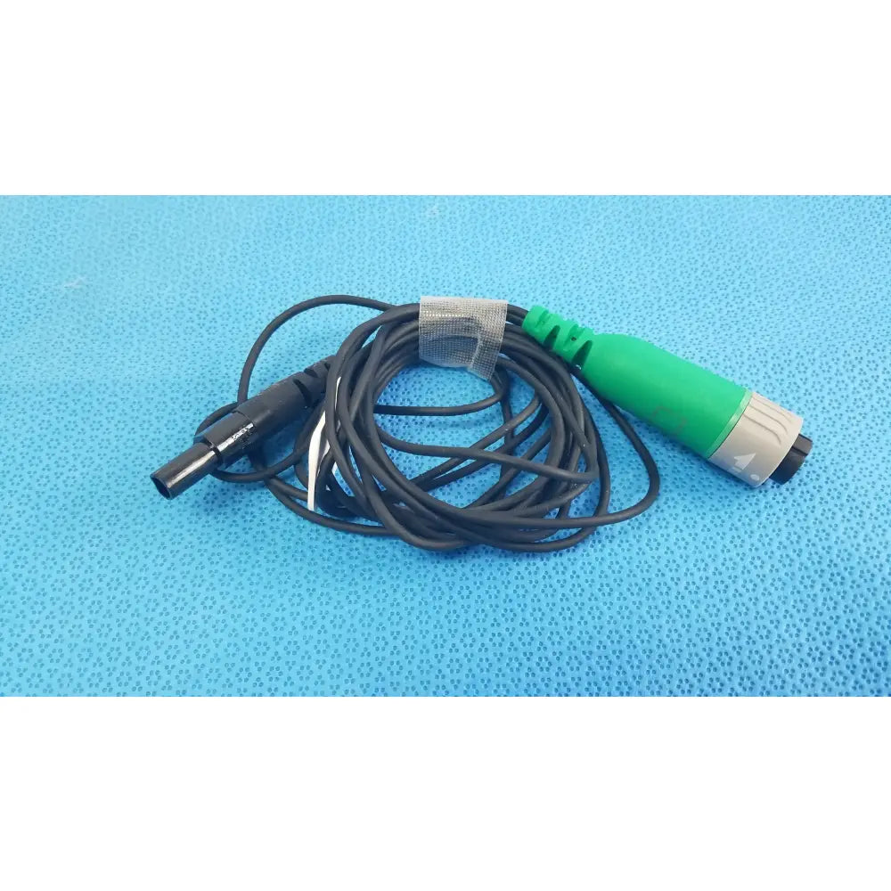 Black coiled catheter connector cable with green gray connector and black plug for reuse medical equipment in EnSite X EP system