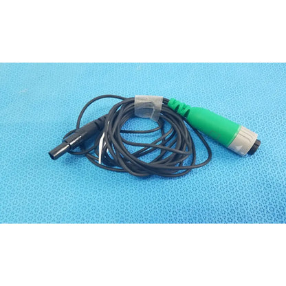 Black coiled catheter connector cable with green gray connector and black plug for reuse medical equipment in EnSite X EP system