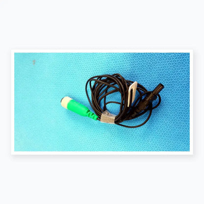 Green and white medical catheter connector cable with black coiled wire for reuse medical equipment EnSite X EP system