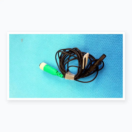 Green and white medical catheter connector cable with black coiled wire for reuse medical equipment EnSite X EP system