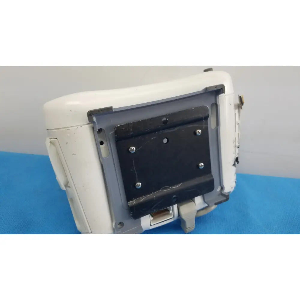 White plastic masimo set ref patient monitor component with black mounting plate secured by silver screws dash 3000