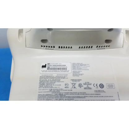 White plastic medical device label with black text barcode showing model numbers dash 3000 4600 5000 masimo set ref