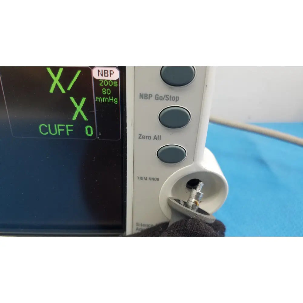White dash 3000 masimo set ref patient monitor with green digital nbp display and go stop zero all control buttons