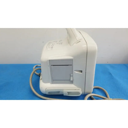 White plastic dash 3000 masimo set ref patient monitor with gray panel and attached cables for medical use