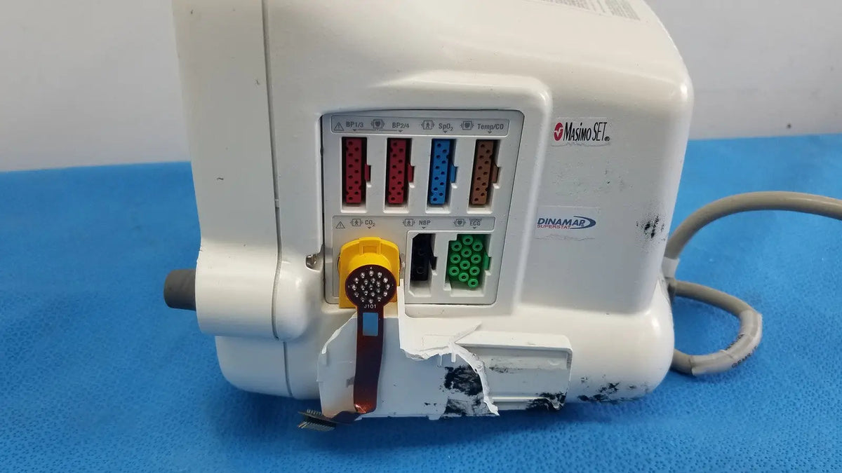 White plastic medical ventilator with colored ports and yellow control knob for dash 3000 masimo set ref patient monitor
