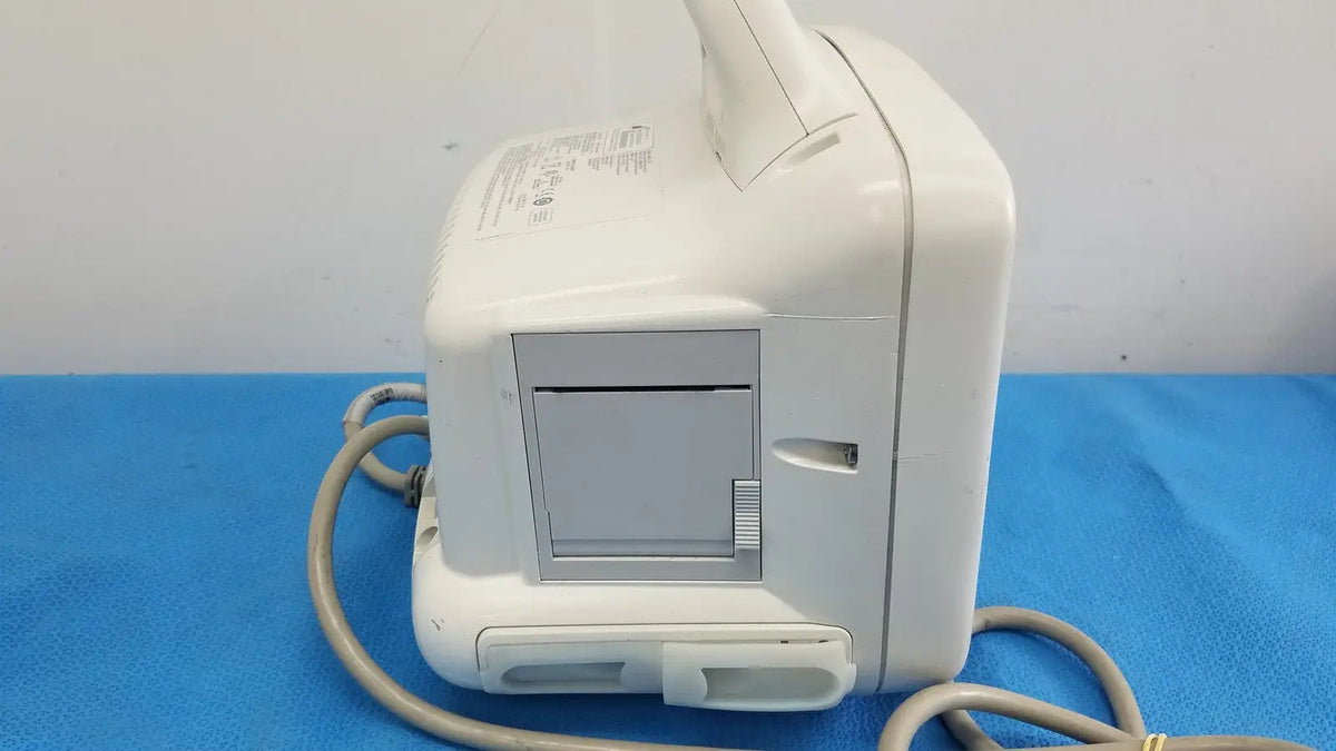 White plastic dash 3000 masimo set ref patient monitor with gray panel and attached cables for medical use