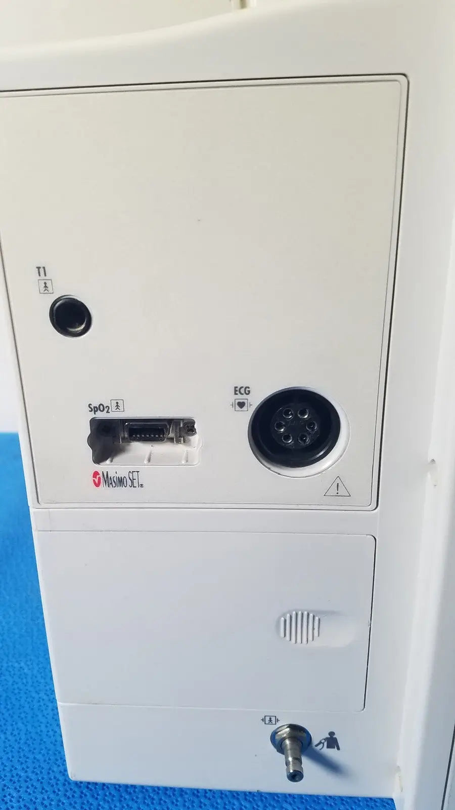 White datascope passport 2 ecg nibp ekg patient monitor panel with labeled spo2 and ecg ports and red medtronic logo