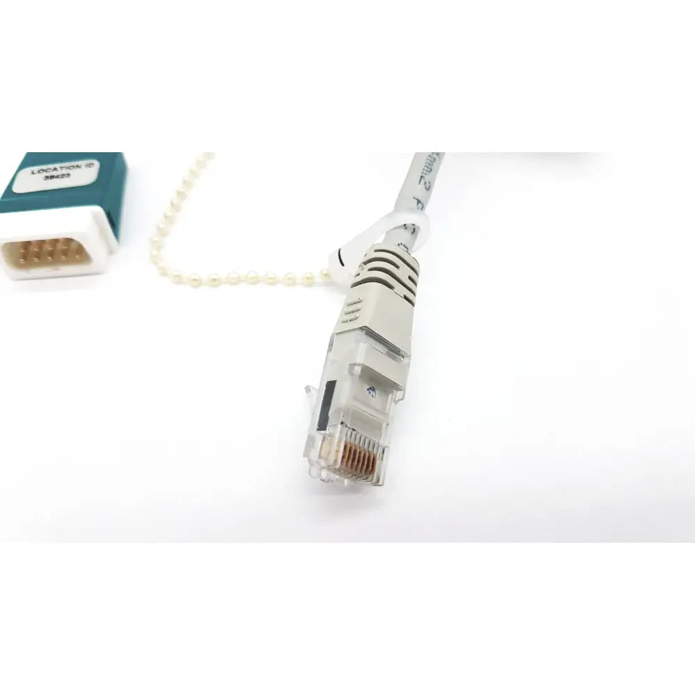 Gray network cable datex ohmeda 885269 with clear connector metallic contacts and white pearl chain 10ft length g-bbha6-4t