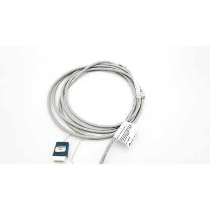 Gray coiled Datex Ohmeda network cable with dark green and white connector housing 10ft length for medical use