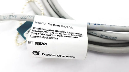 Gray and black coiled datex ohmeda network cable g-bbha6-4t with white label for medical monitor 10ft length