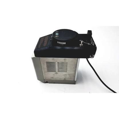Black and silver datex ohmeda tec 6 desflurane anesthesia vaporizer with control knob and power cord visible