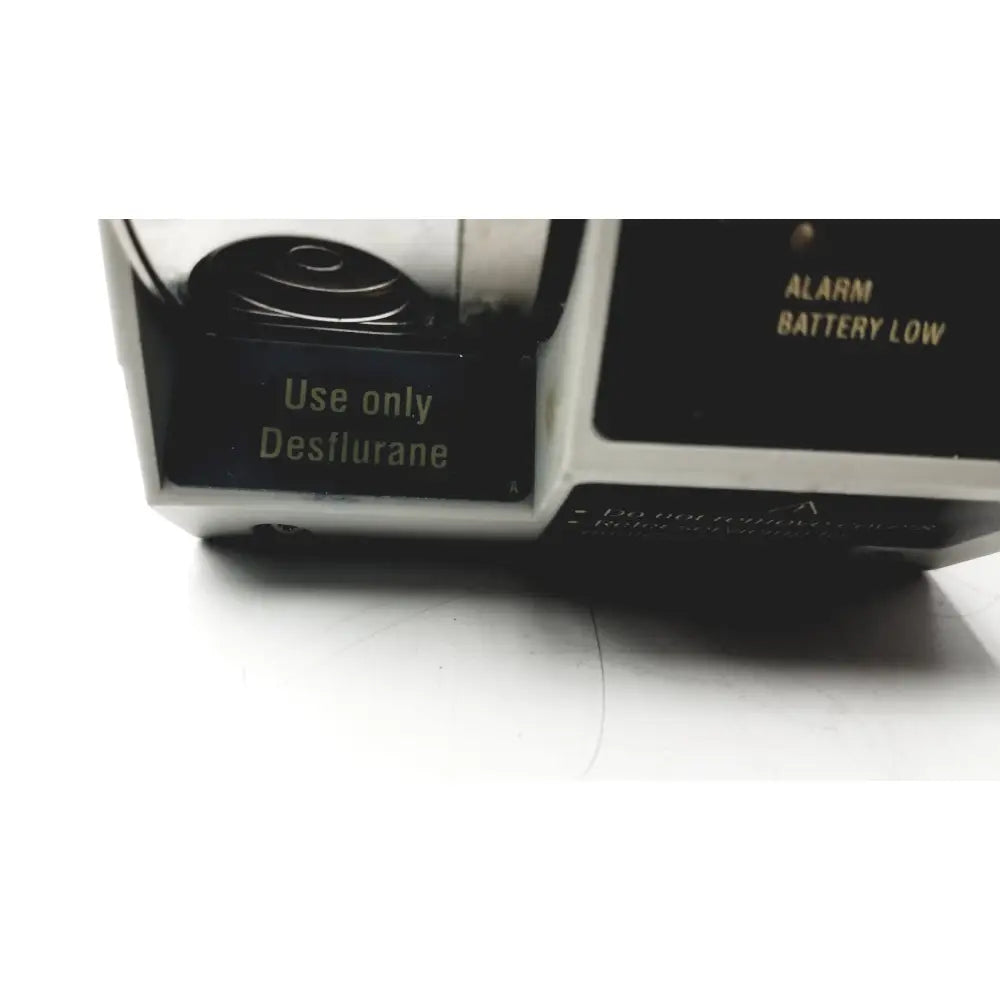 Black and silver datex ohmeda tec 6 desflurane anesthesia vaporizer with use only desflurane label