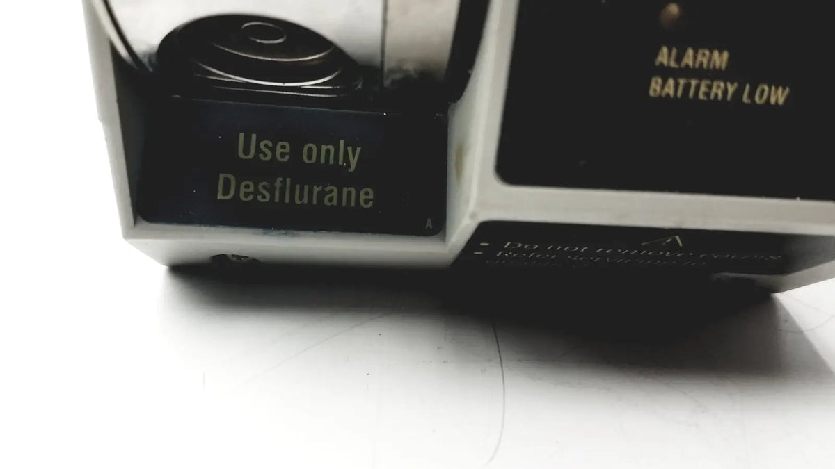 Black and silver datex ohmeda tec 6 desflurane anesthesia vaporizer with use only desflurane label
