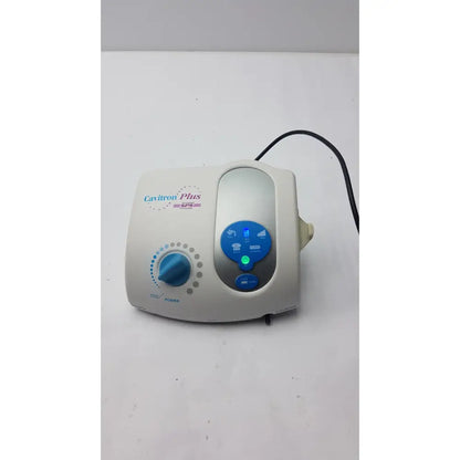 Beige dentsply caviitron plus ultrasonic scaling unit gen 136 with blue control panel and power dial