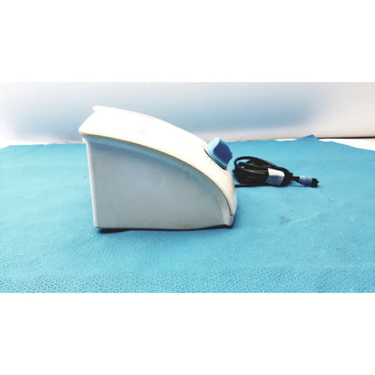 Dentsply cavitron plus ultrasonic scaling unit gen-131 in white and blue with curved ergonomic design for dental use