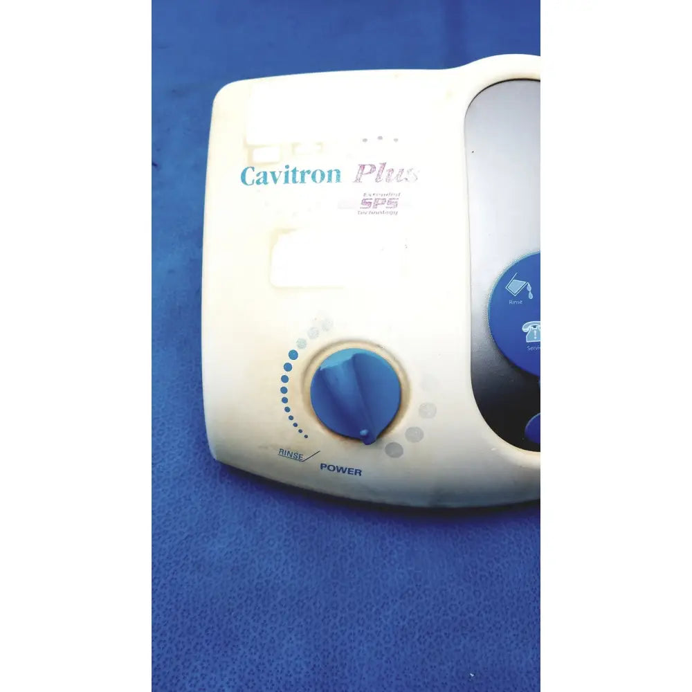 Cream-colored dentsply cavitron plus ultrasonic scaling unit type GEN-131 with blue dial and control buttons