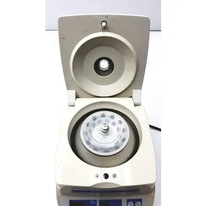 Beige denville scientific 260d brushless micro centrifuge with circular rotor and control panel for laboratory use