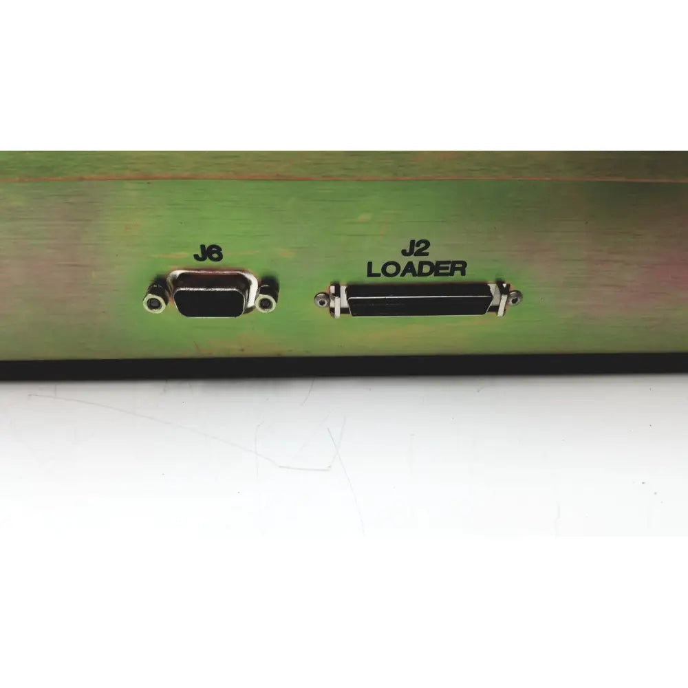 Two labeled d-sub connectors j8 and j2 mounted on green metallic surface of dickinson facs loader electronics interface module