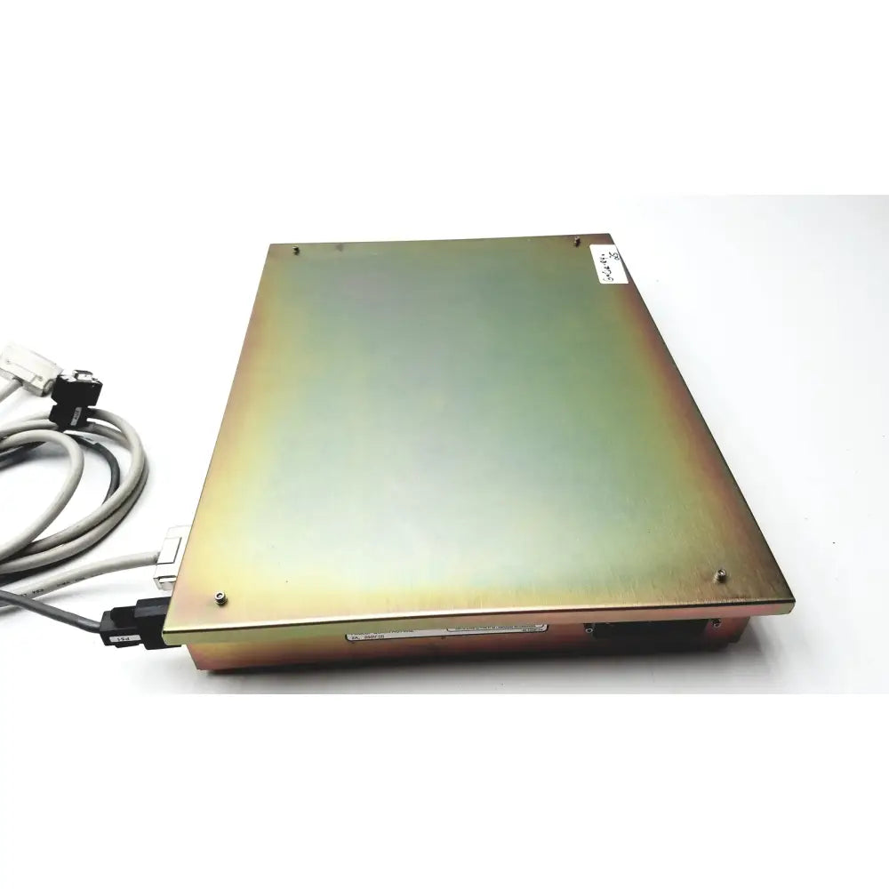 Rectangular metallic dickinson facs loader interface module with brushed gold finish and visible edge screws