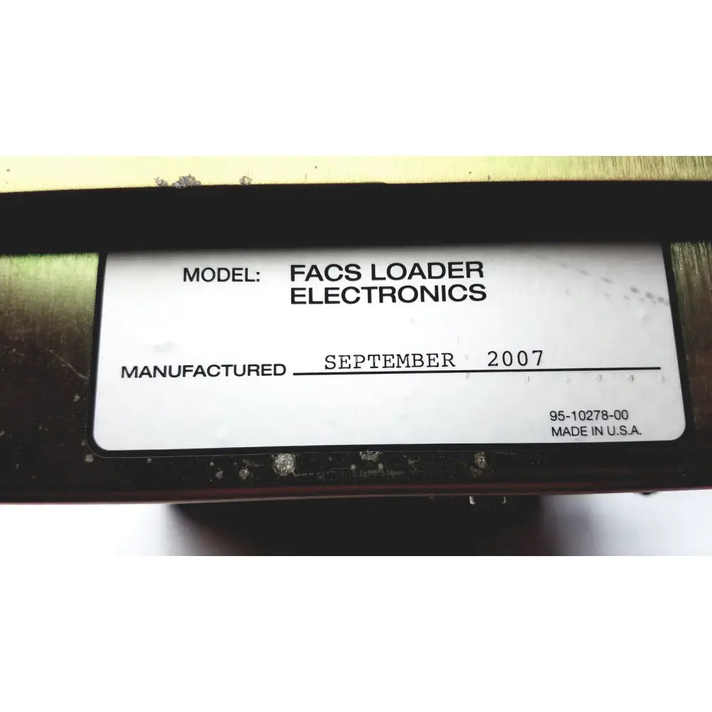 White label on black dickinson facs loader electronics module showing model facs loader electronics and manufactured september 2007