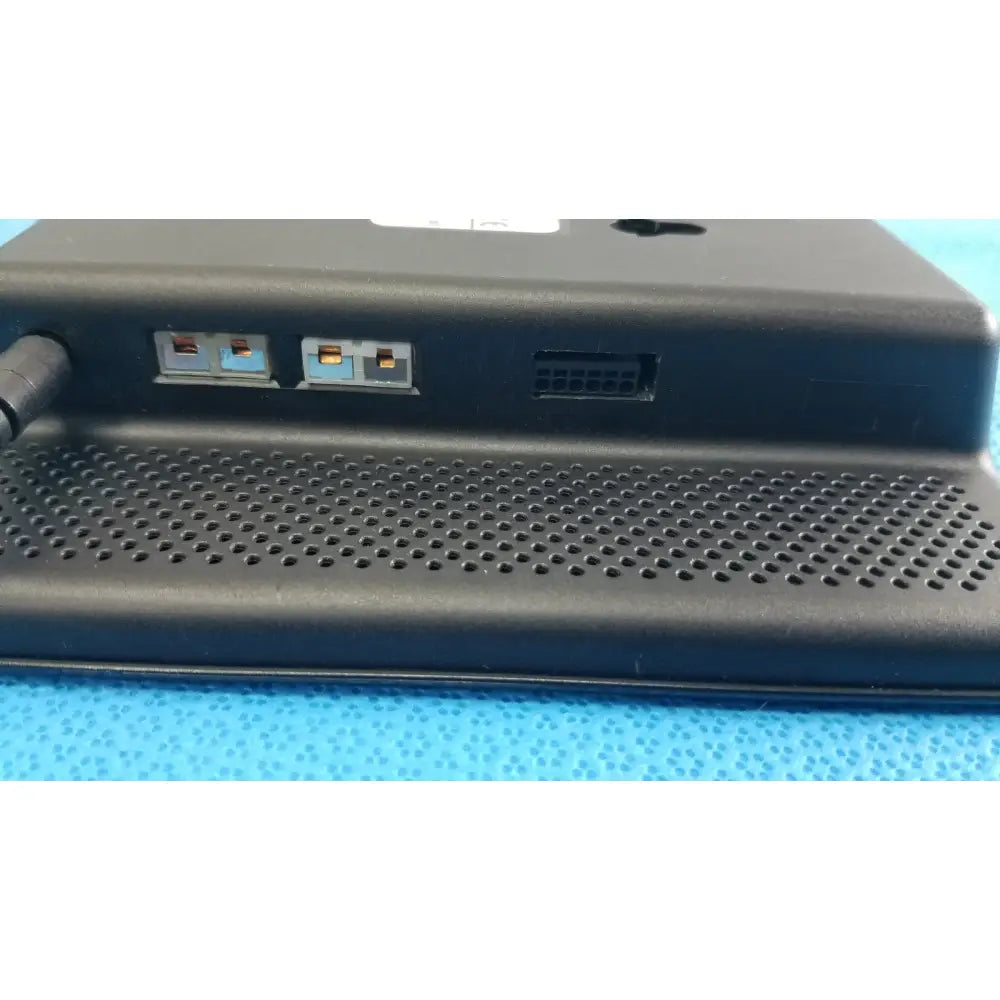 Black plastic dickson data logger model ft630 with perforated front panel and multiple ports on the back side