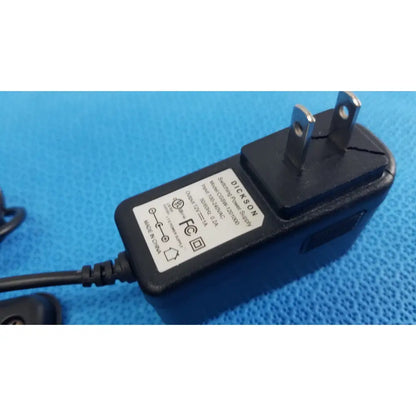 Black plastic dickson data logger ac adapter with two-prong plug and attached power cord for model ft630 recorder
