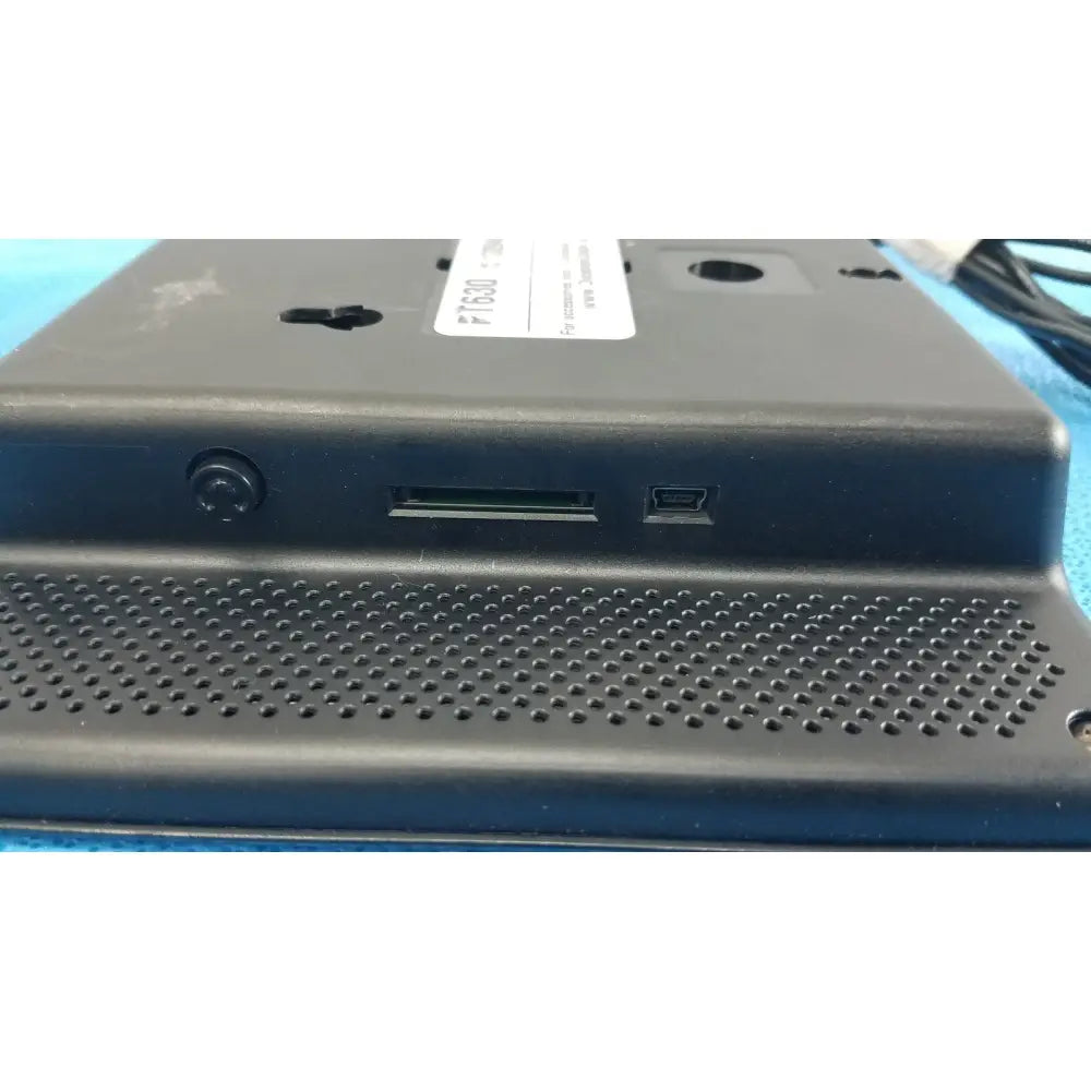 Black plastic dickson data logger model ft630 back side with perforated grille usb port and sd card slot