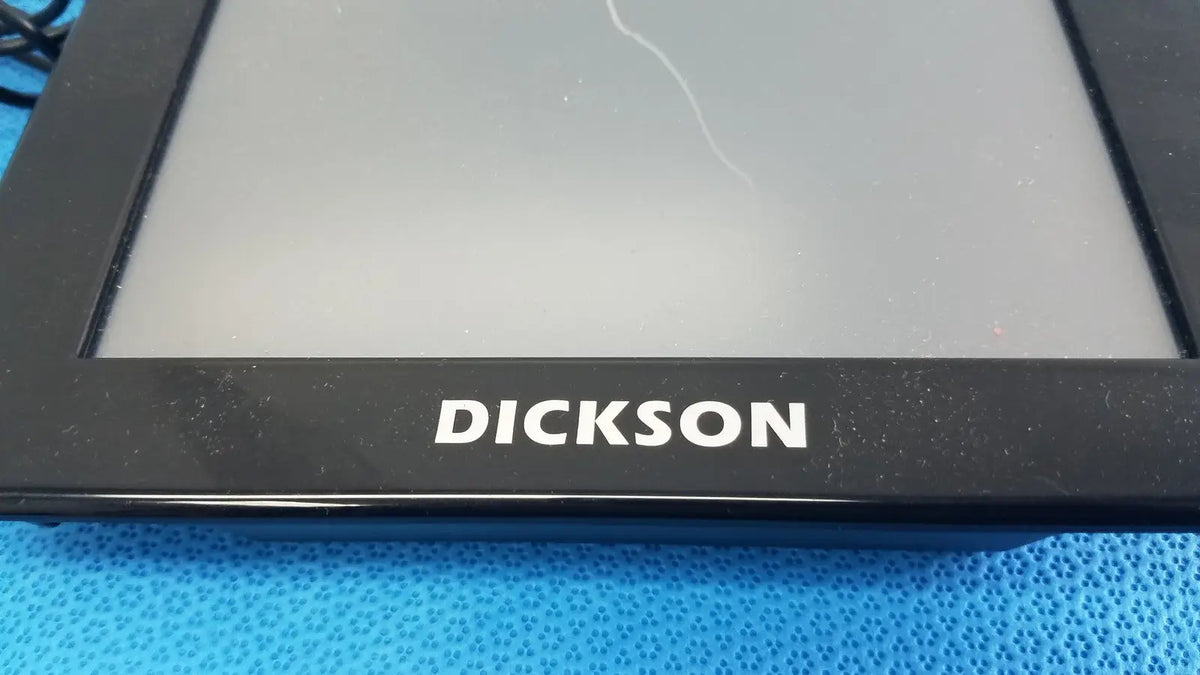 Black dickson data logger model FT630 with electronic display and a visible crack on the glossy glass surface
