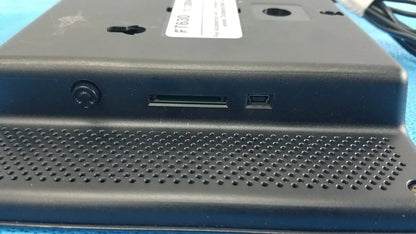 Black plastic dickson data logger model ft630 back side with perforated grille usb port and sd card slot