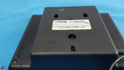 Black plastic back panel of dickson data logger ft630 with perforated ventilation grilles and white model label