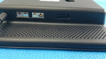 Black plastic dickson data logger model ft630 with perforated front panel and multiple ports on the back side