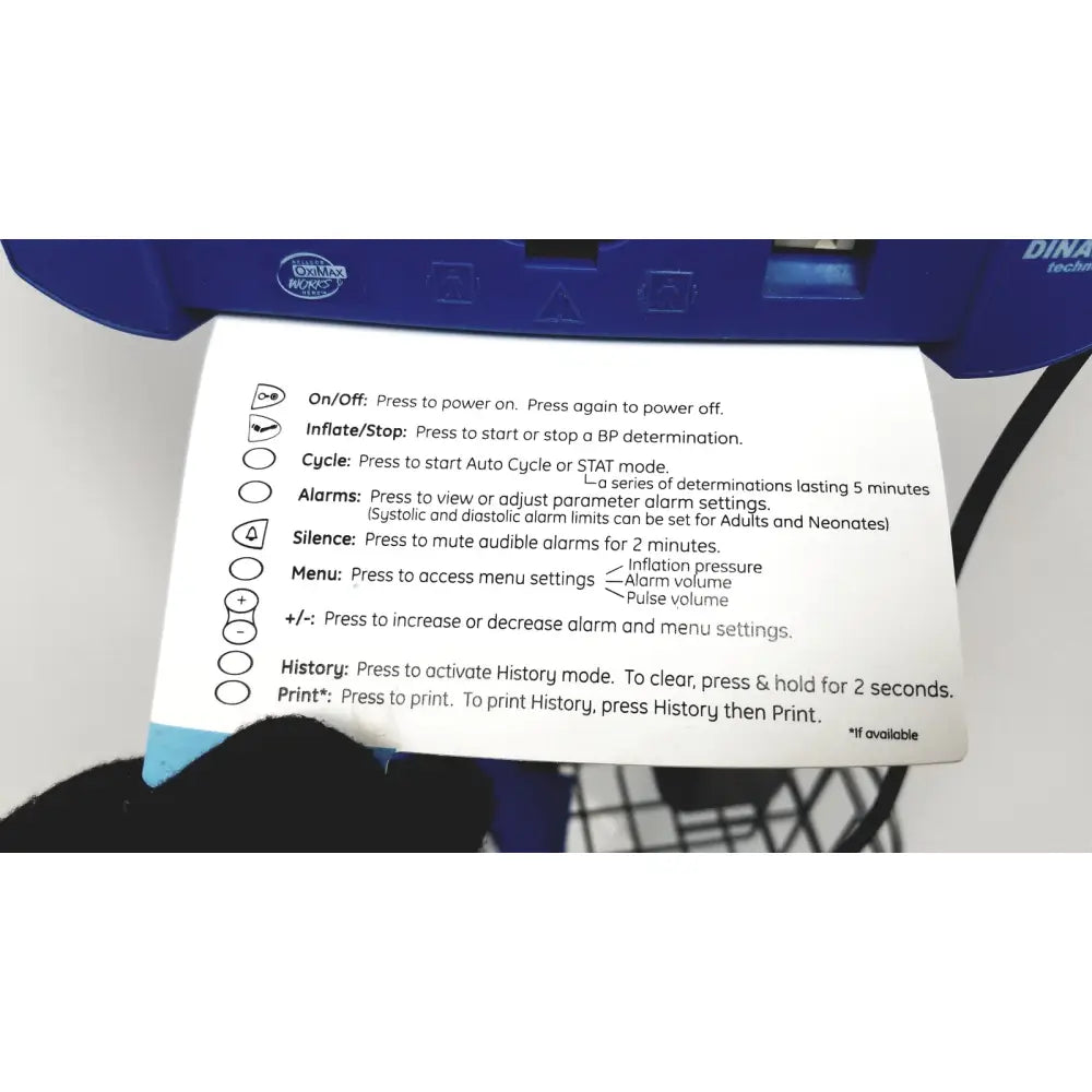 Blue plastic blood pressure monitor with printed instruction sheet for dinamap v100 vital signs monitors with rolling stand