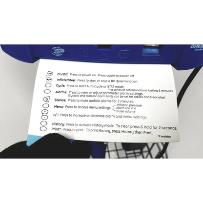 Blue plastic blood pressure monitor with printed instruction sheet for dinamap v100 vital signs monitors with rolling stand