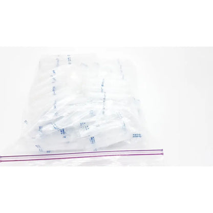 Clear plastic zip-top bag containing multiple individually wrapped white disposable dental things for single use