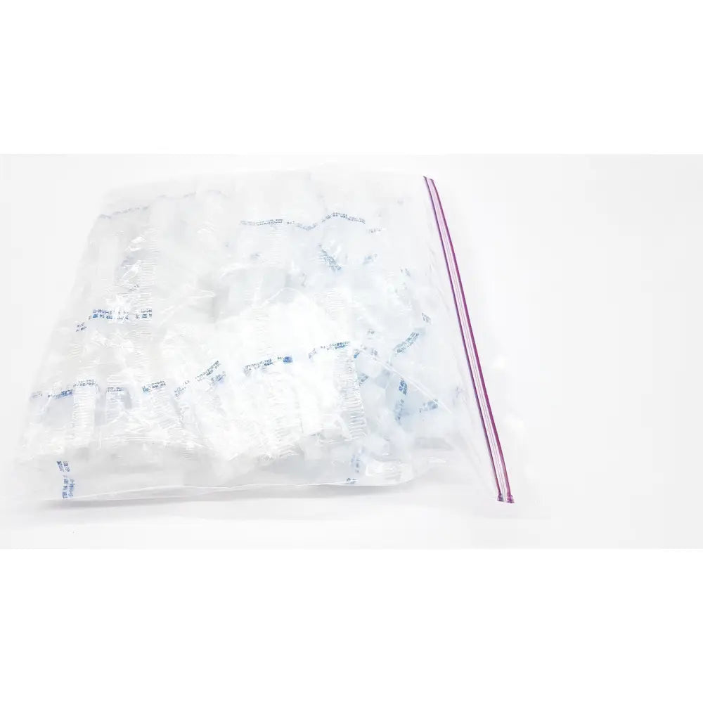 Clear plastic disposable dental things bag with purple zip-top seal for hygienic storage and easy access