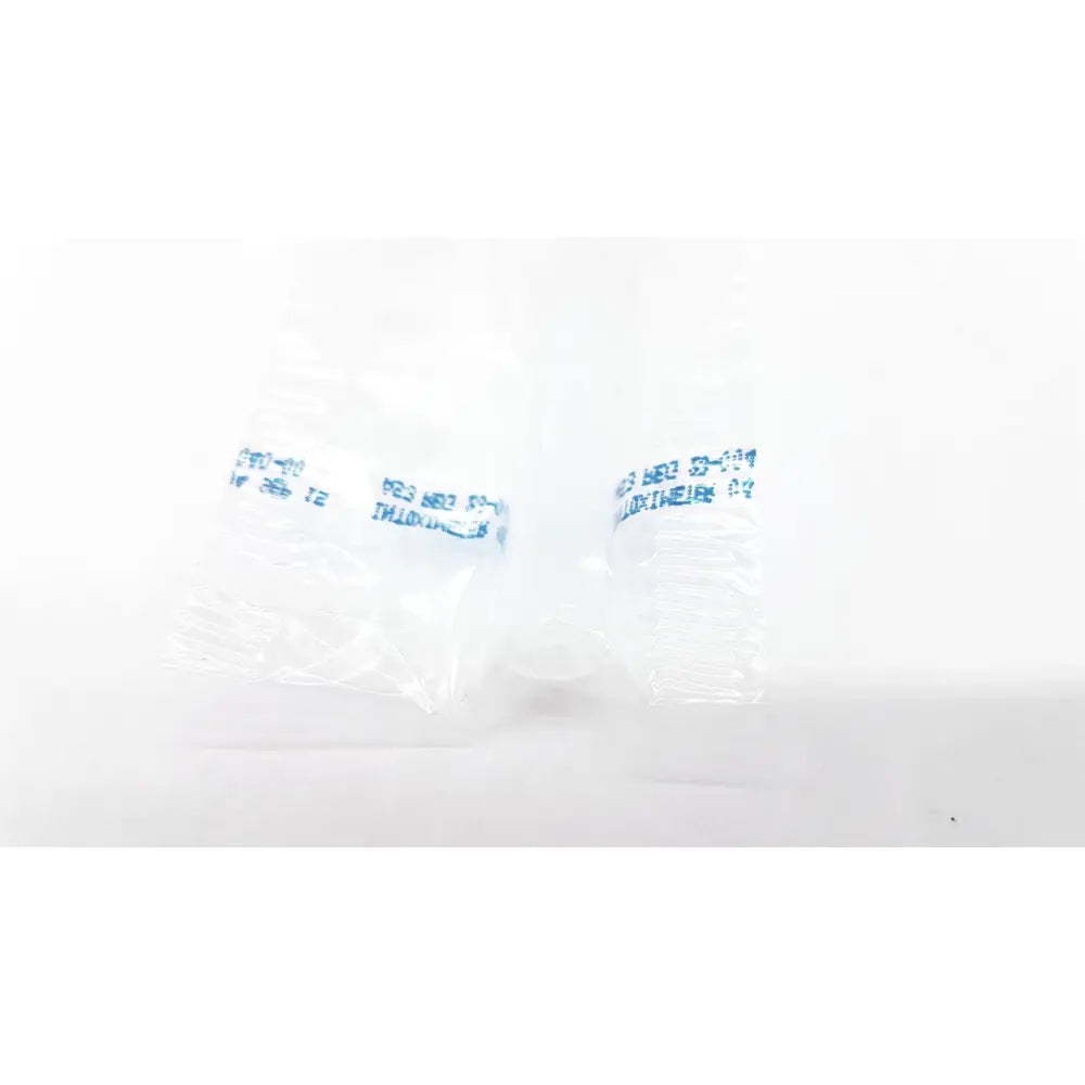 Clear plastic packaging with blue text containing a small white object for disposable dental things reuse medical use