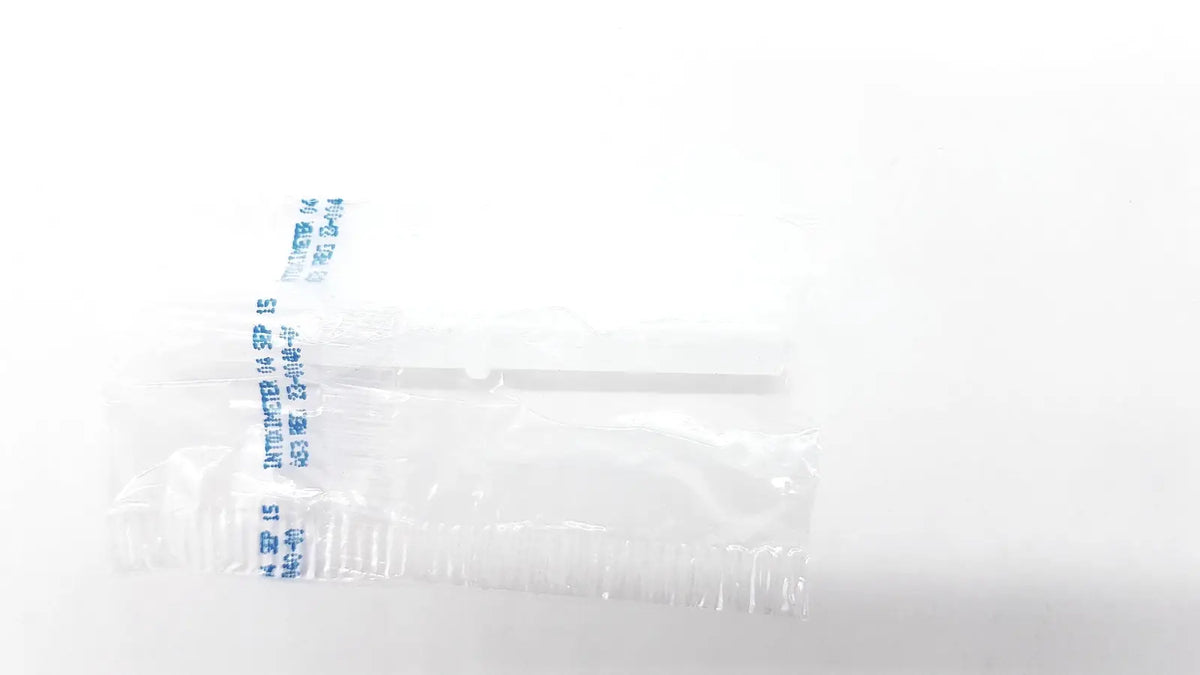 Clear plastic-wrapped disposable dental things lollipop stick with blue printed text on the wrapper
