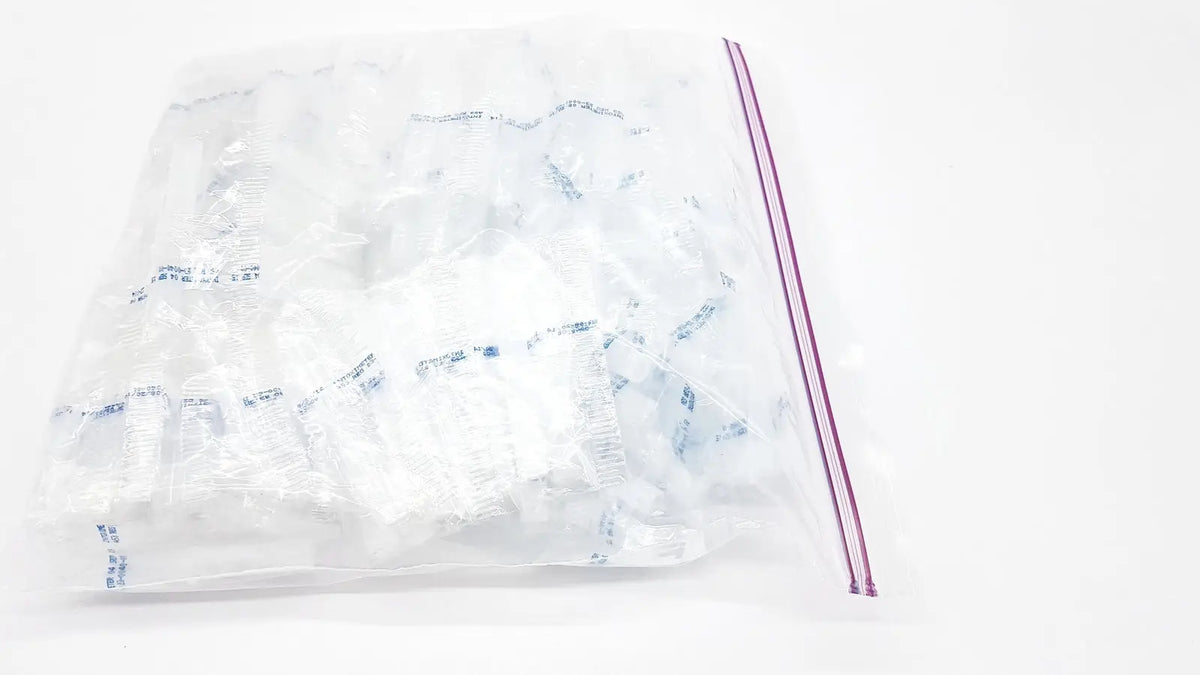 Clear plastic disposable dental things bag with purple zip-top seal for hygienic storage and easy access