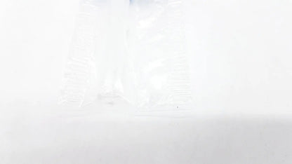Clear plastic disposable dental things bag with crinkled texture and subtle light reflections for reuse medical use